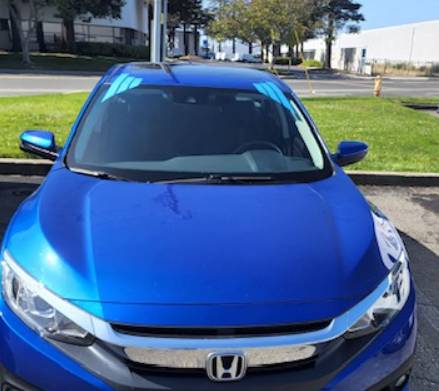 Blue Honda Civic with a newly replaced windshield